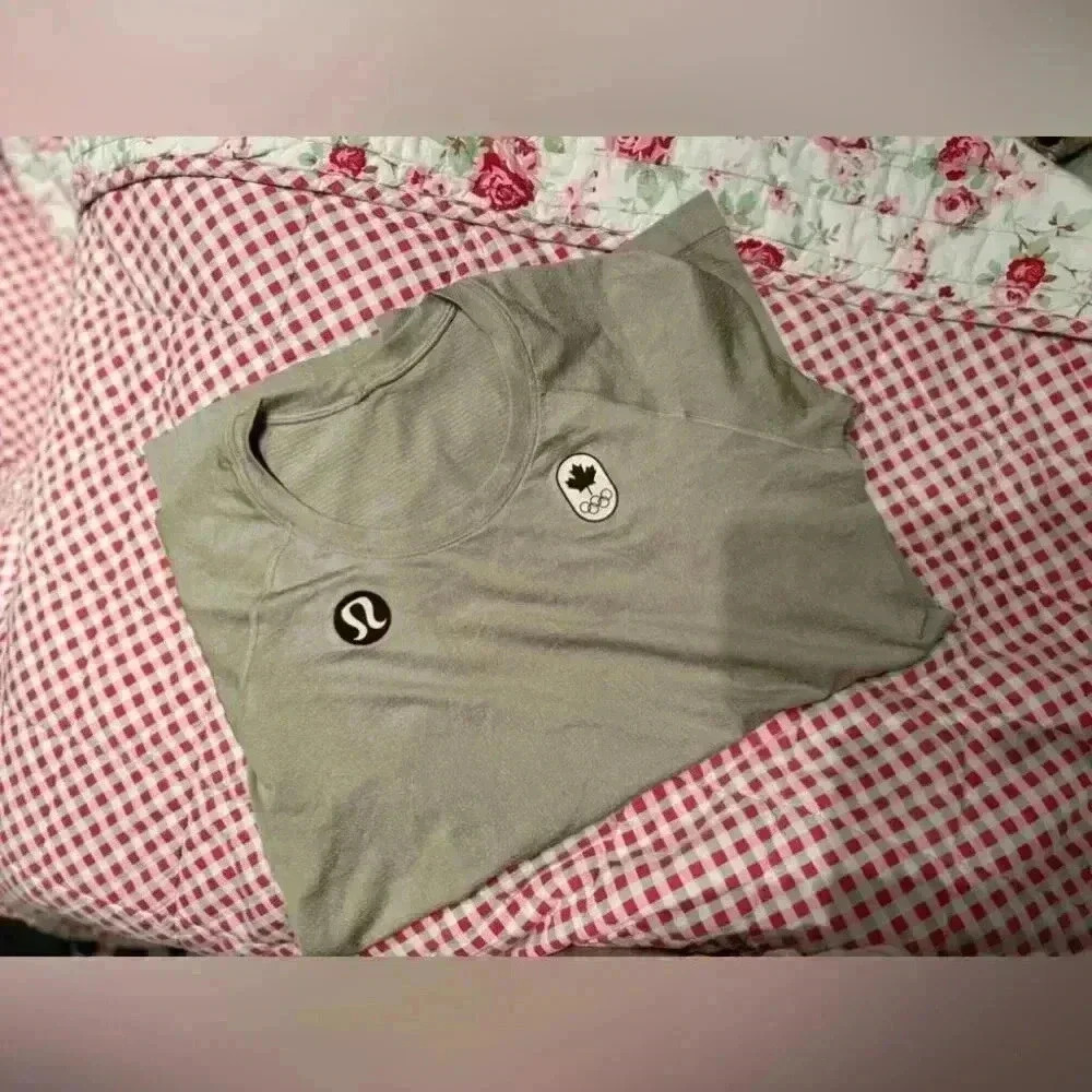 LULULEMON “official Olympics gear swiftly tech long sleeve 2.0” size 12